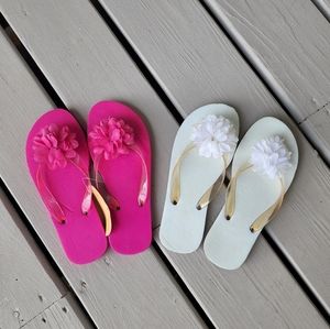 Sz S one pink and one white 2 pairs of flip flops